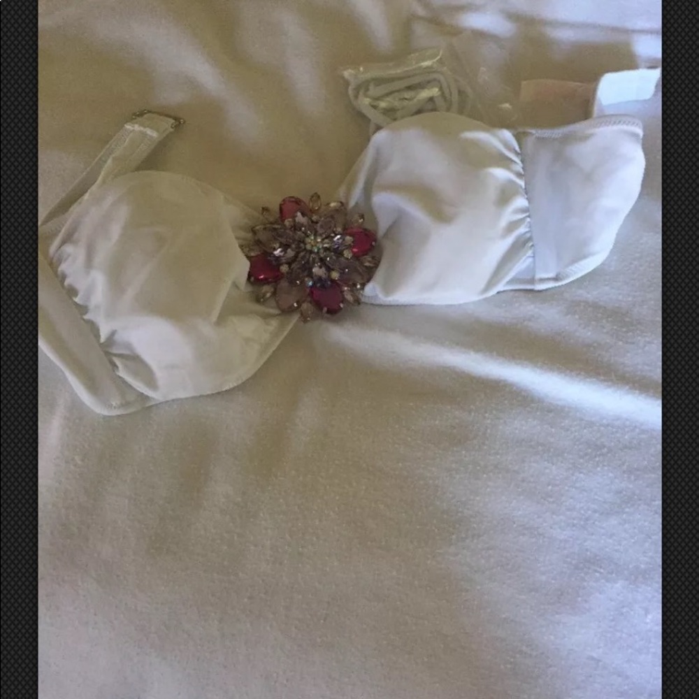 Victoria’s Secret bikini top with jewel flower